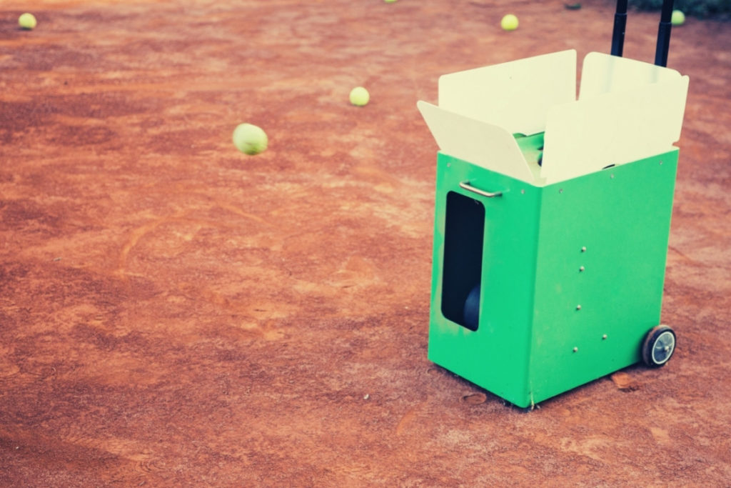 6 Best Tennis Ball Machines in 2024 for all Skill Levels shelf